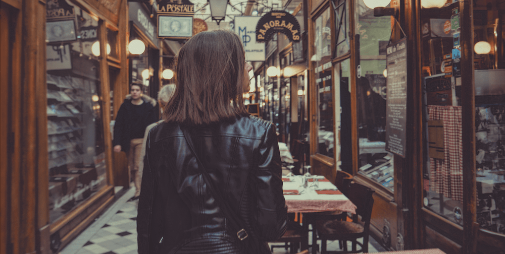 Woman shopping in a retail arcade