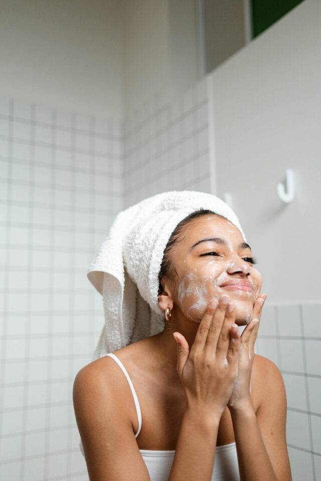 woman applying cream
