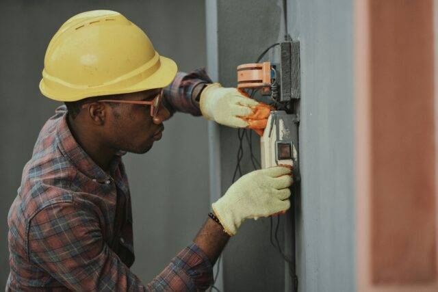 An industrial worker in a hard hat at work