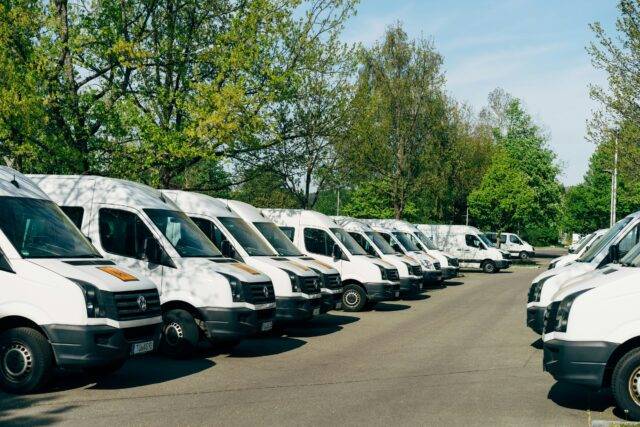 Vans parked in a parking lot