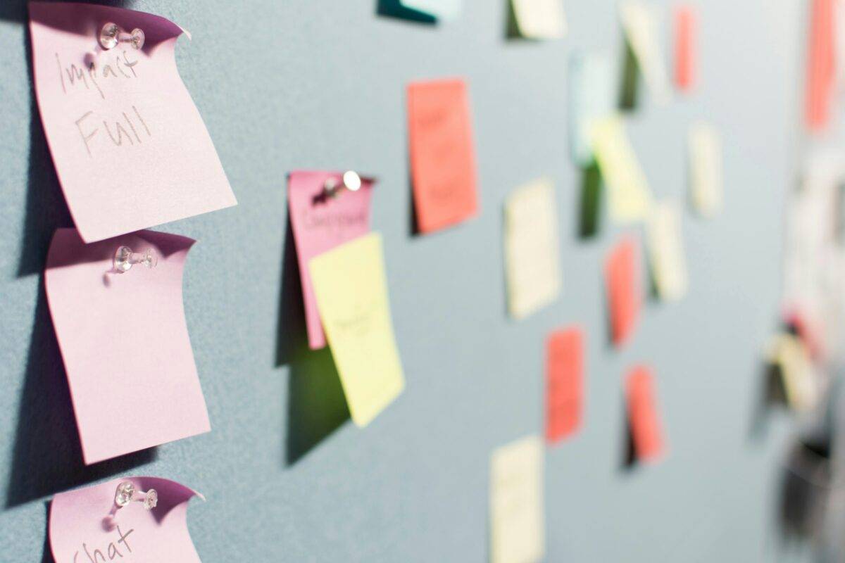 Board of post-it notes in a workplace